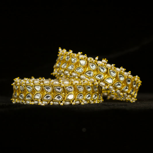 Royal Jadau Kundan Pearl Bangles with 22k gold platingThis product belongs to Jadau Kundan jewellery category 
