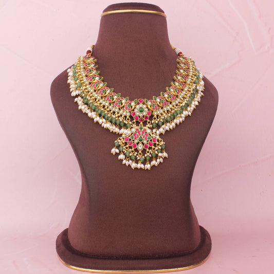 Regal Jadau Kundan Necklace With     Pearl Tassel Drops