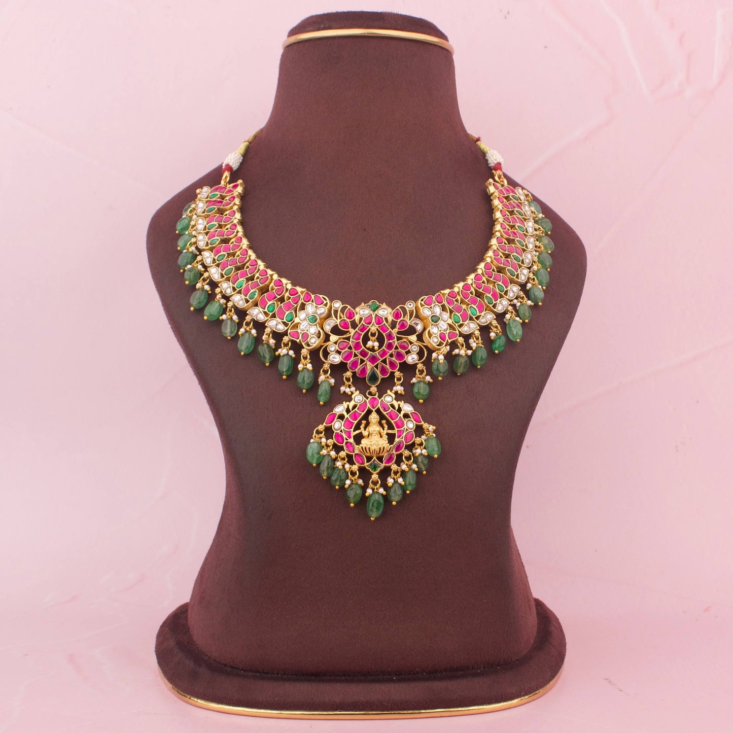 Unique Jadau Kundan Necklace With Goddess Laxmi Pendant And Green Beads