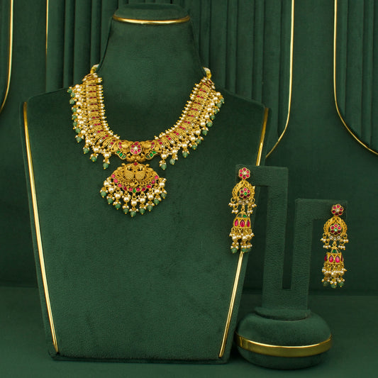Chandbali necklace with matching earrings in gold and green peacock design