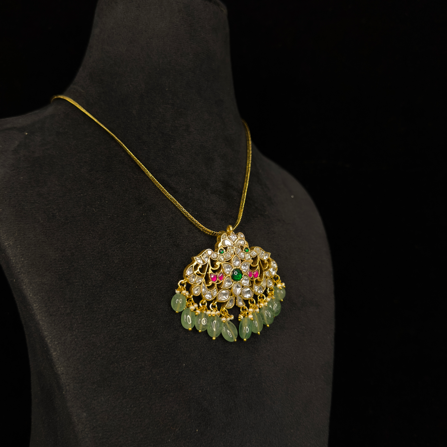 Elegant Jadau Kundan Chain Pendant Necklace with Green Bead Accents with 22k gold plating this product belongs to jadau kundan jewellery catigory