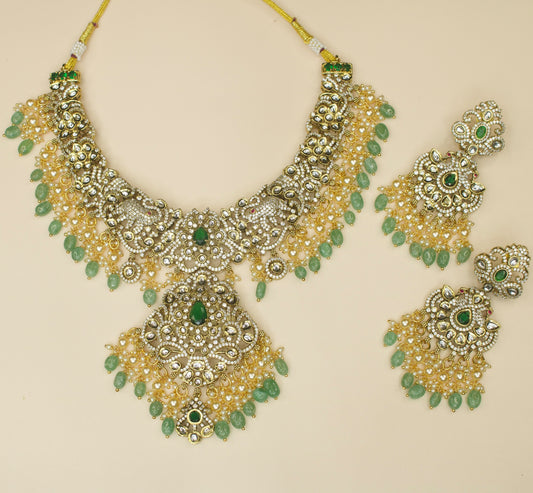 Elevating Victorian Kundan Necklace with Earrings Polki, pearls, and beads. This Victorian Jewellery is available in a Green colour variant. 