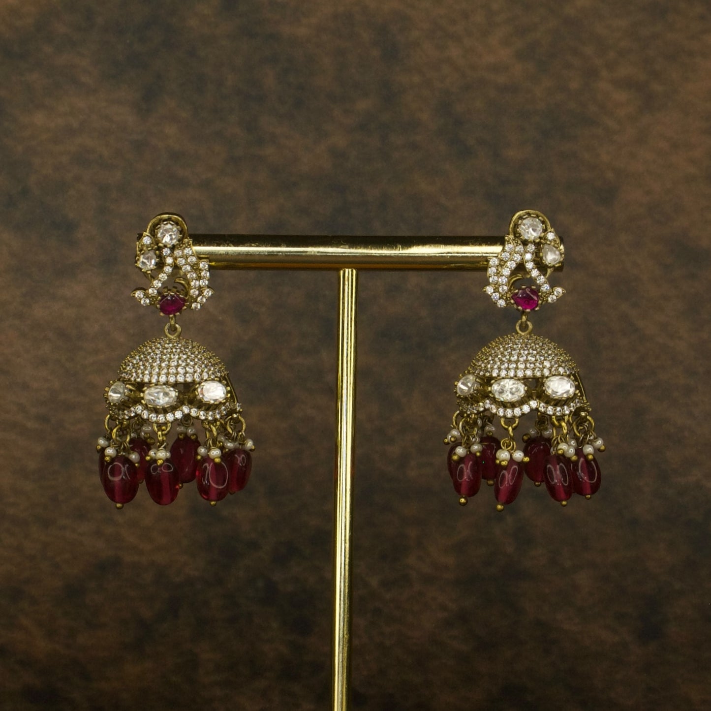 Victorian Charm Jhumka Earrings with CZ and Kundan Stones WITH High Quality Victorian Finish . This Product Belongs to Victorian Jewellery Category