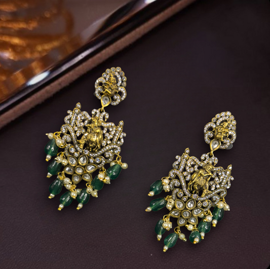 Temple Design Victorian  Pushback Earrings with Russian beads, Zircon stones, kundan polki and pearls. This Victorian Jewellery is available in a Green colour variant. 