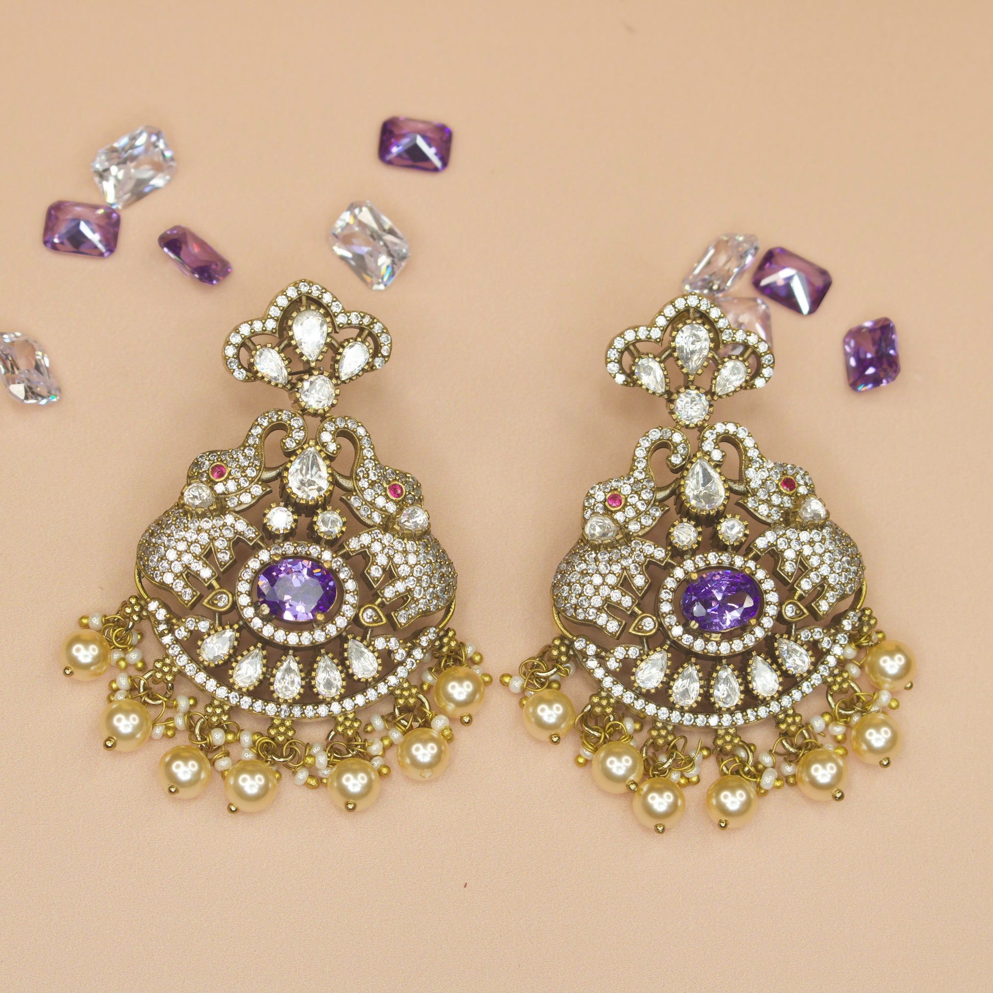 Elegant Victorian Chandbali Earrings with Elephant Motifs. This Victorian Jewellery is available in Red,Green & Purple colour variants. 