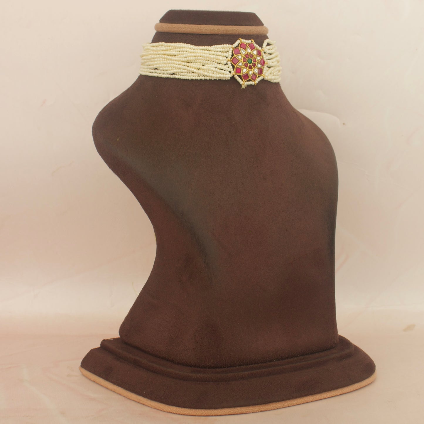 Sleek jadau kundan locket pearl choker with white beaded band and pink pendant