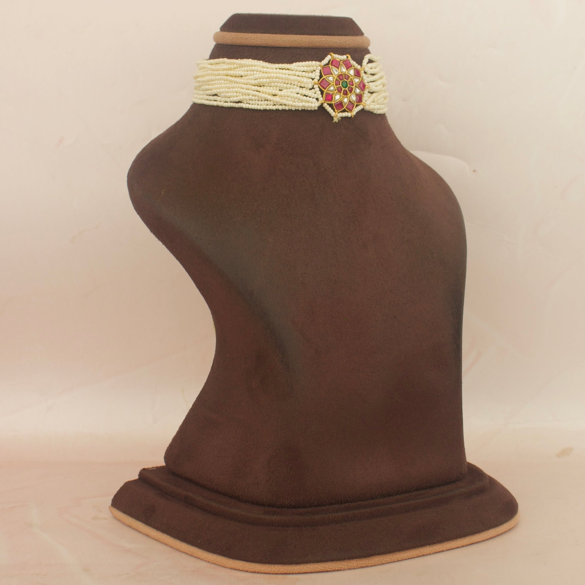 Sleek jadau kundan locket pearl choker with white beaded band and pink pendant