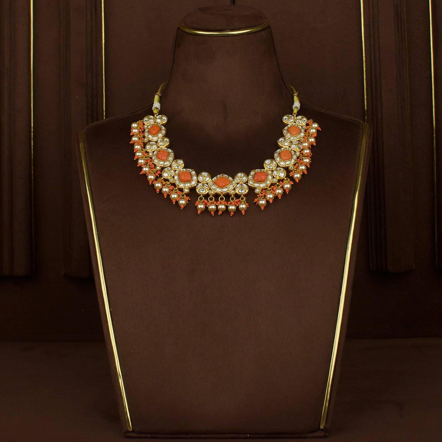 Luxurious Jadau Kundan Necklace Set with Coral Accents