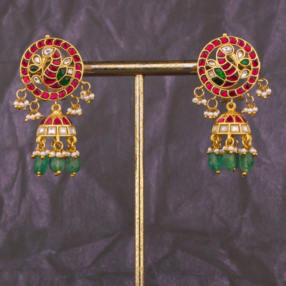 Radiant Jadau Kundan Jhumki Earrings With Emerald Drops - Handcrafted Indian Bridal Jewelry by Dulhan Jewels