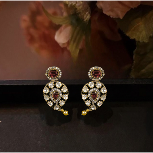 Mango design Victorian Polki Stud earrings. This Victorian Jewellery Is available in Red & Purple colour varaiants. 