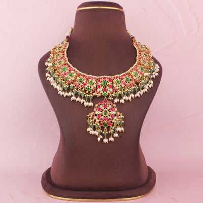 Classic Kundan Necklace With Ruby Accents And Pearl Tassels
