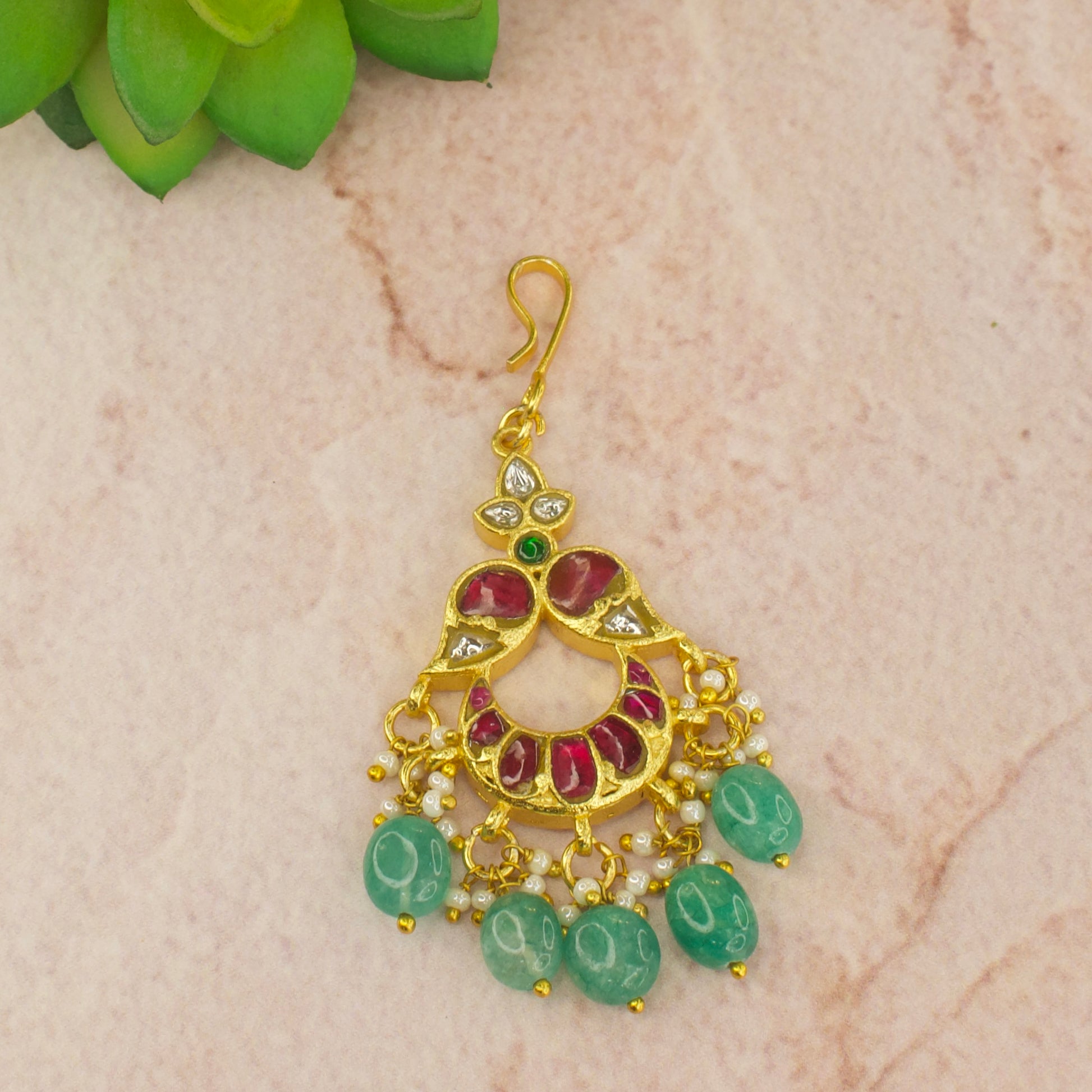 Simple Jadau Kundan Maang tikka with green beads in 22k Gold plating. 