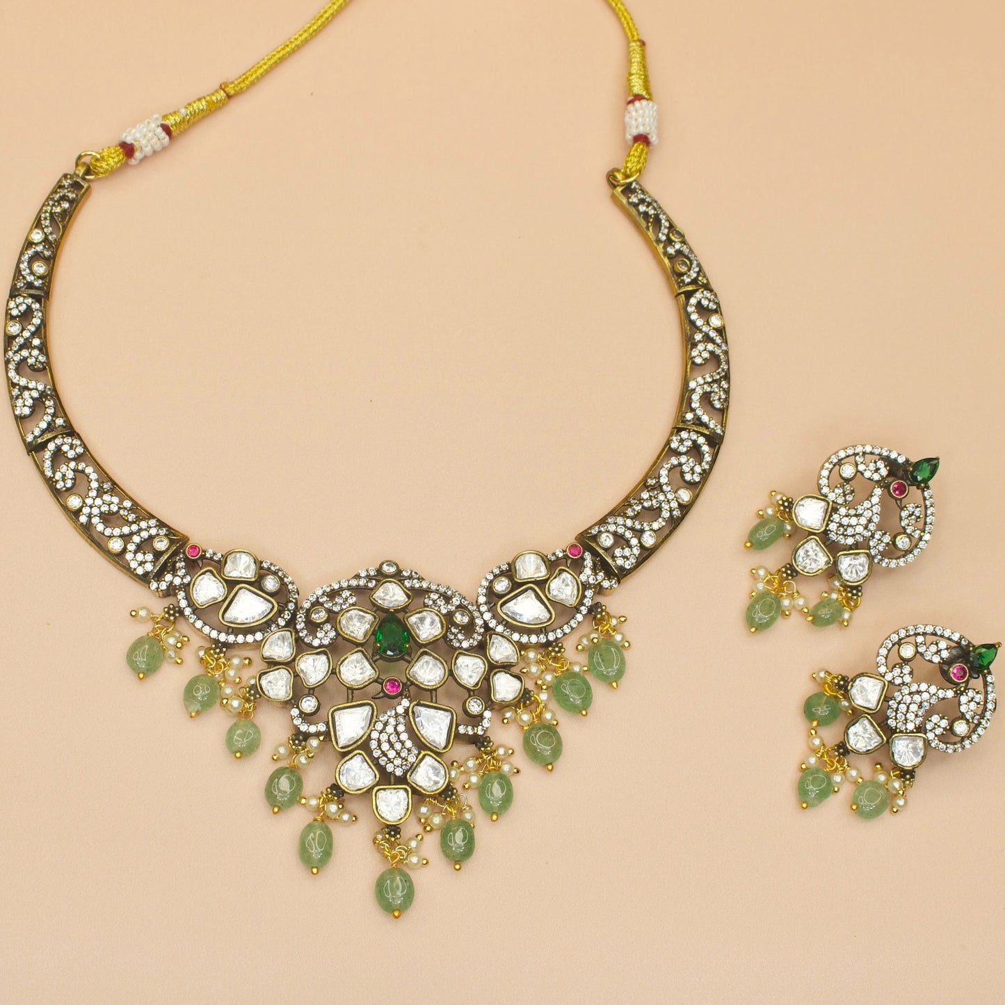Peacock Victorian Kanti Necklace Set in green colour. This Victorian Jewellery is available in a Green colour variant. 