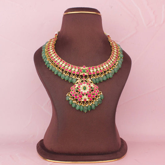 Jadau Kundan Short Necklace With Floral Pendant And Green Hangings