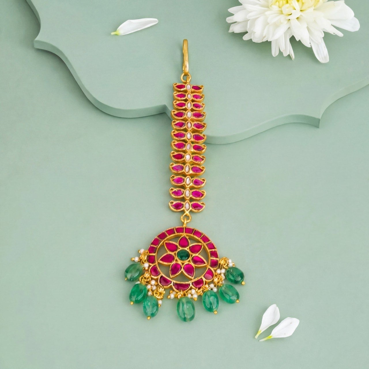 Premium gold Floral Jadau Kundan Maang Tikka With Emerald Beads adorned with ruby stones, pearls