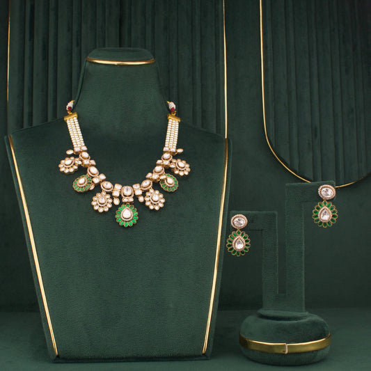 Emerald Polki Necklace Set With Floral Motifs And Matching Earrings - Handcrafted Indian Bridal Jewelry by Dulhan Jewels