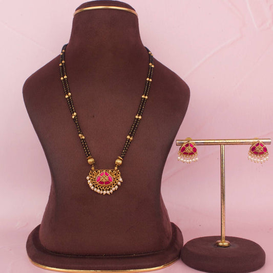Sleek Jadau Kundan Black Beads With Matching Earrings
