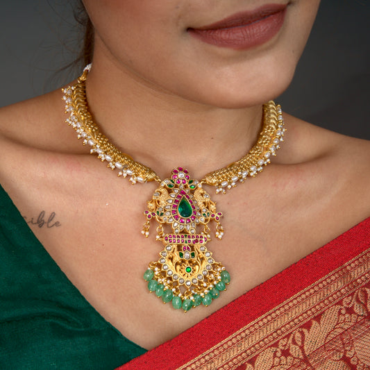 Regal Jadau Kundan Kanti Necklace with Pearl  Detailing with 22k gold plating. this product belongs to jadau kundan jewejjery category