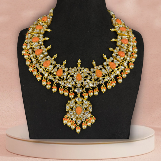 Serene Coral Jadau Kundan Necklace With Pearls with 22k Gold Plating This product belongs to Jadau Kundan jewellery category 