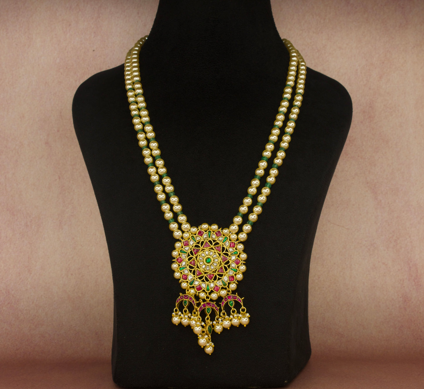 Elegant Jadau Kundan Beads Mala with Pearl and Green Beads With 22k gold plating. This product belongs to Jadau Kundan jewellery category