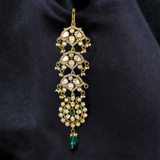 Elaine Moissanite Polki Victorian Maang Tikka. This Victorian Jewellery Is available in Pink & Green colour varaiants. 