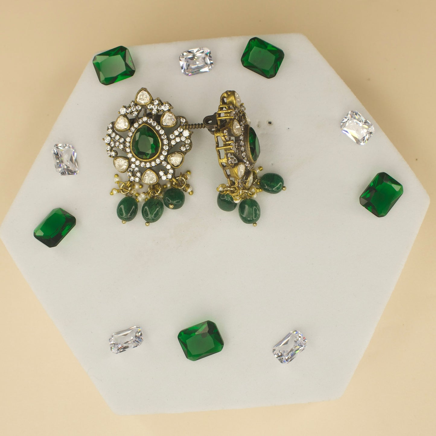 Polki studded Victorian plated studs with high quality victorian finish. available in ruby and green