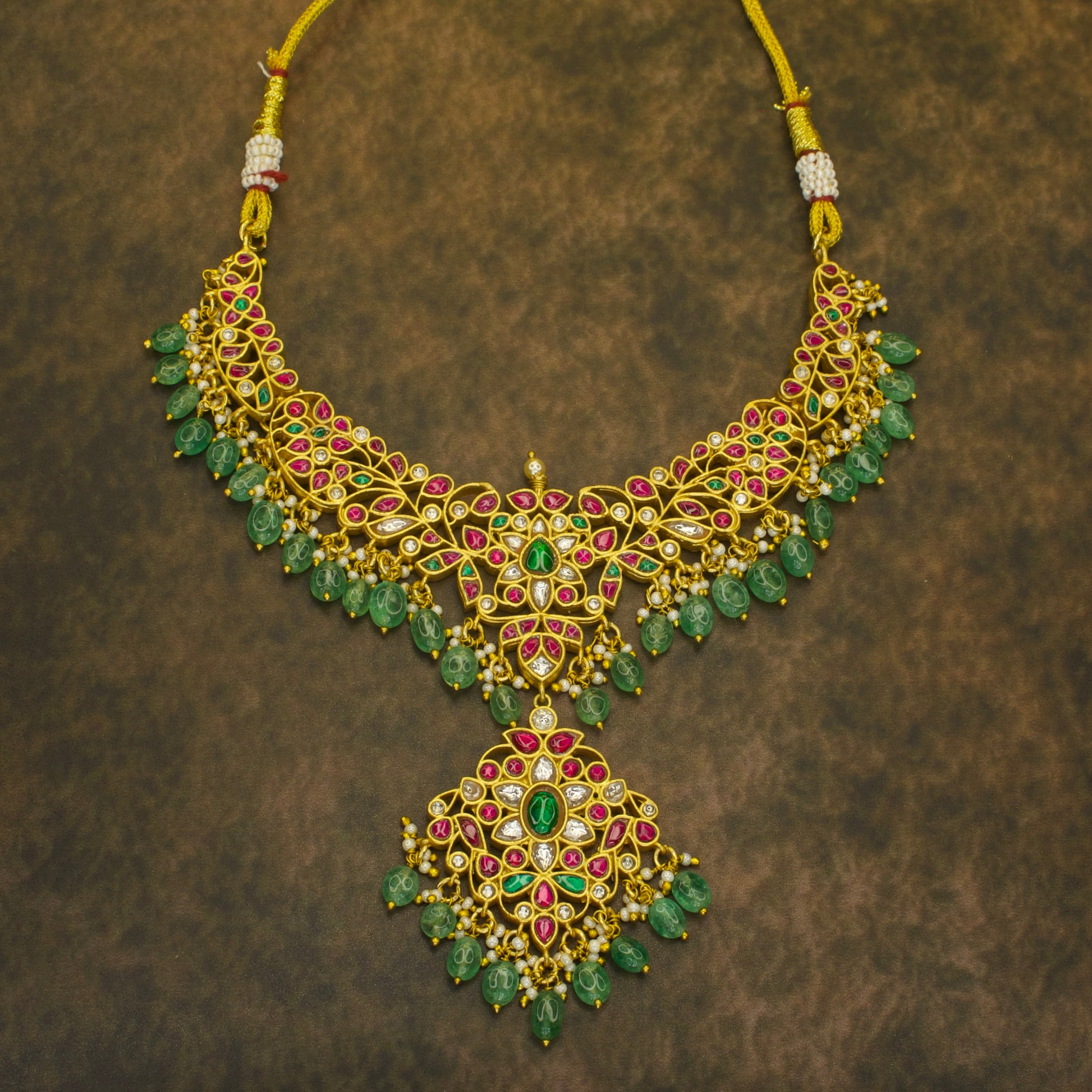 Grand Floral Jadau Kundan Necklace with Green Bead Drops WIth 22k goldThis Product Belongs to Jadau Kundan Jewellery Category