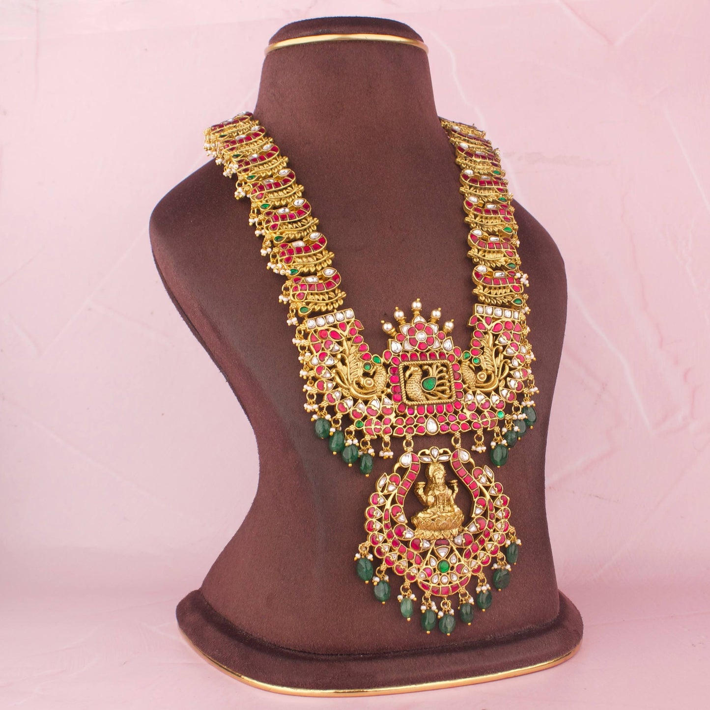 Side view of premium gold temple Bridal Lakshmi Haram Necklace With Peacock Design And Emerald