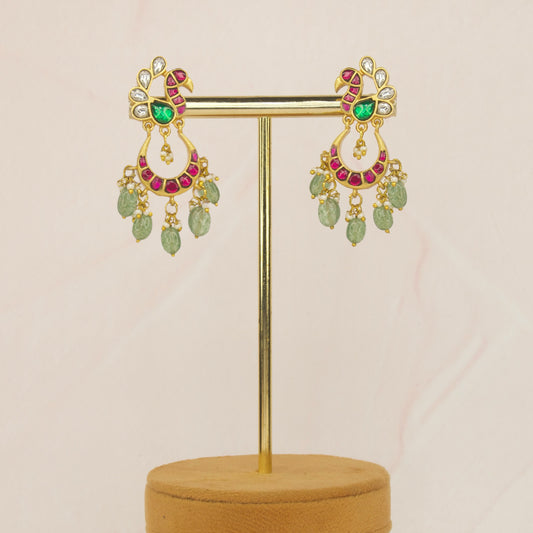 Simple Peacock Designs Jadau Kundan Chandbali Earrings with 22k gold plating. This Product belongs to Jadau Kundan jewellery Category