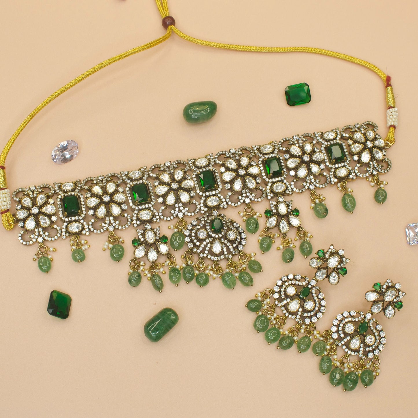Regal Victorian Polki Choker Necklace Set
 with zircon, polki, pearls, and beads, including matching earrings. This Victorian Jewellery is available in Green & Purple colour variants. 