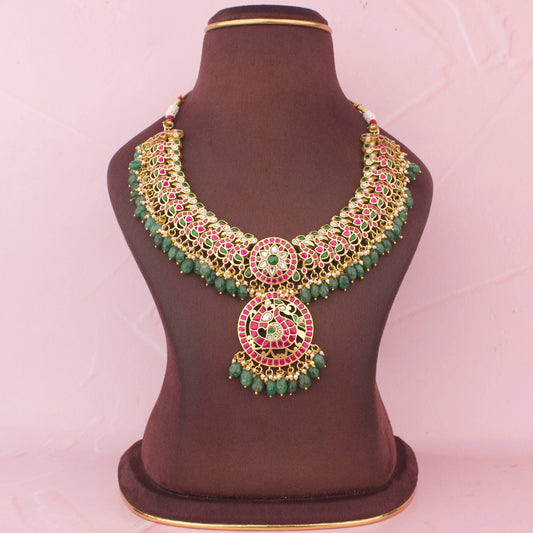 Majestic Jadau Kundan Necklace With Green Drop Hangings And Peacock Design Pendant
