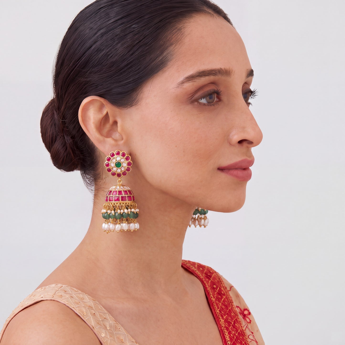 Traditional Jhumka Earrings with Green Beads And Pearl Drops