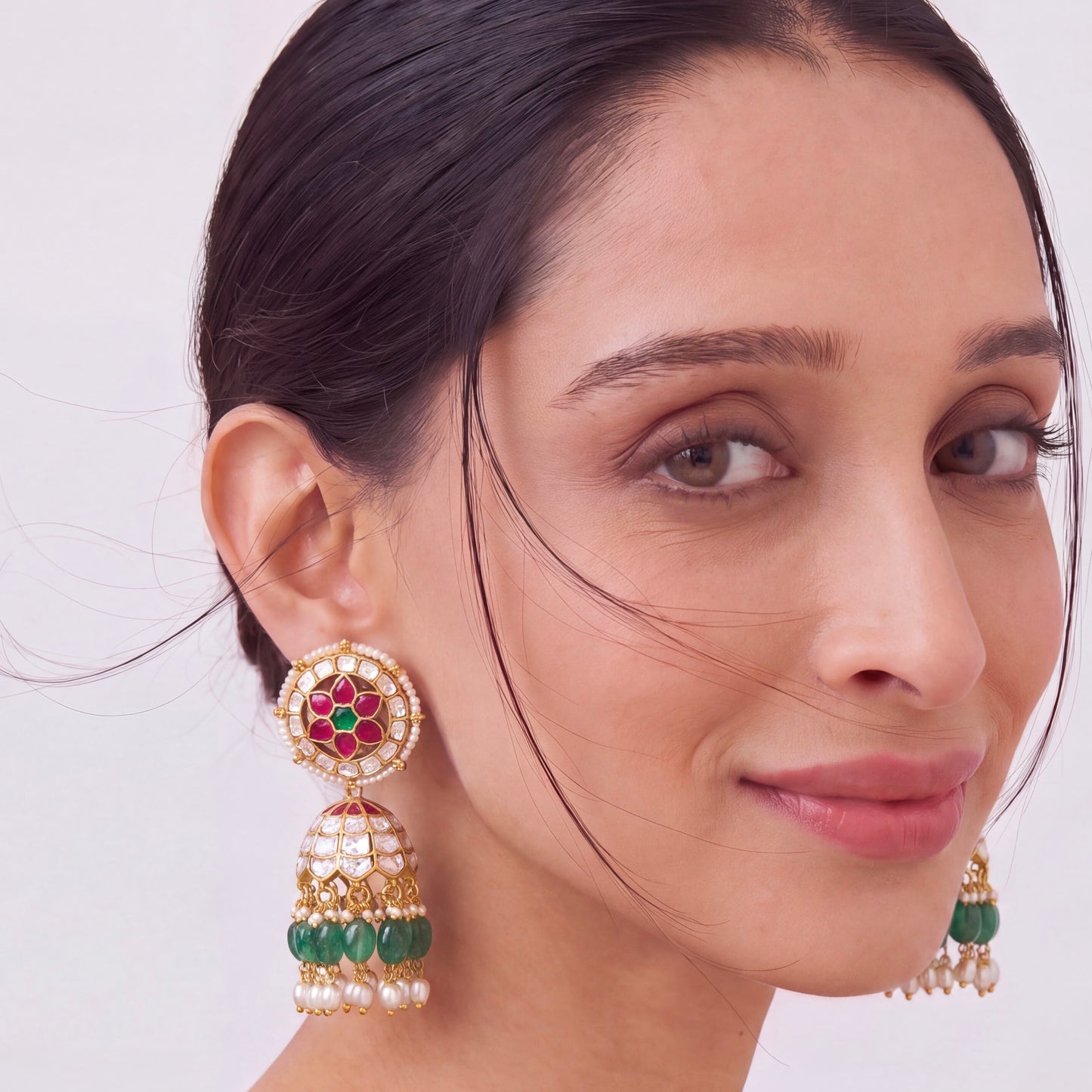 Floral Jadau Kundan Jhumka Earrings with Green Beads