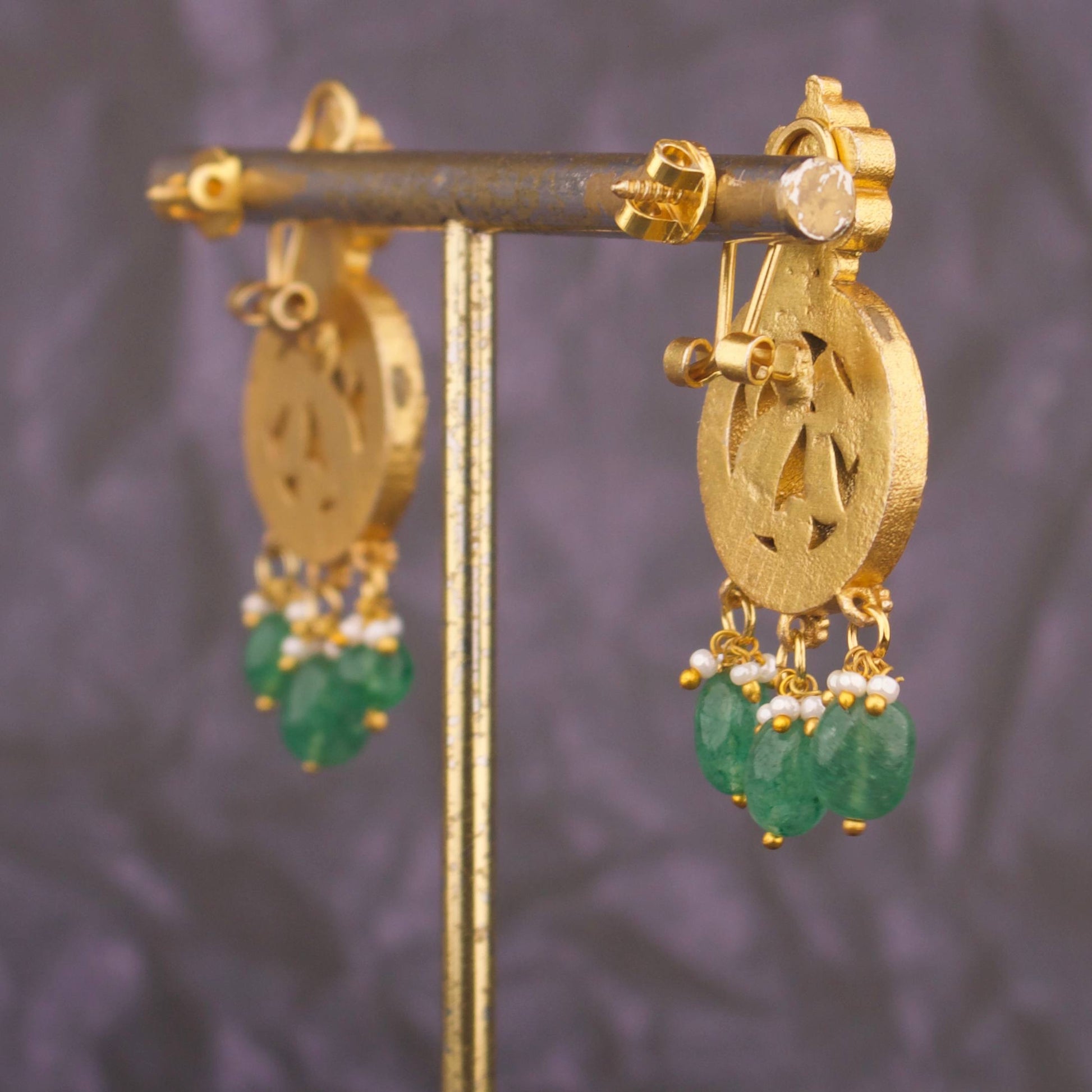 Unique Jadau Kundan Earrings With Emerald Drops Close-up Design & Gemstone Detailing - Dulhan Jewels