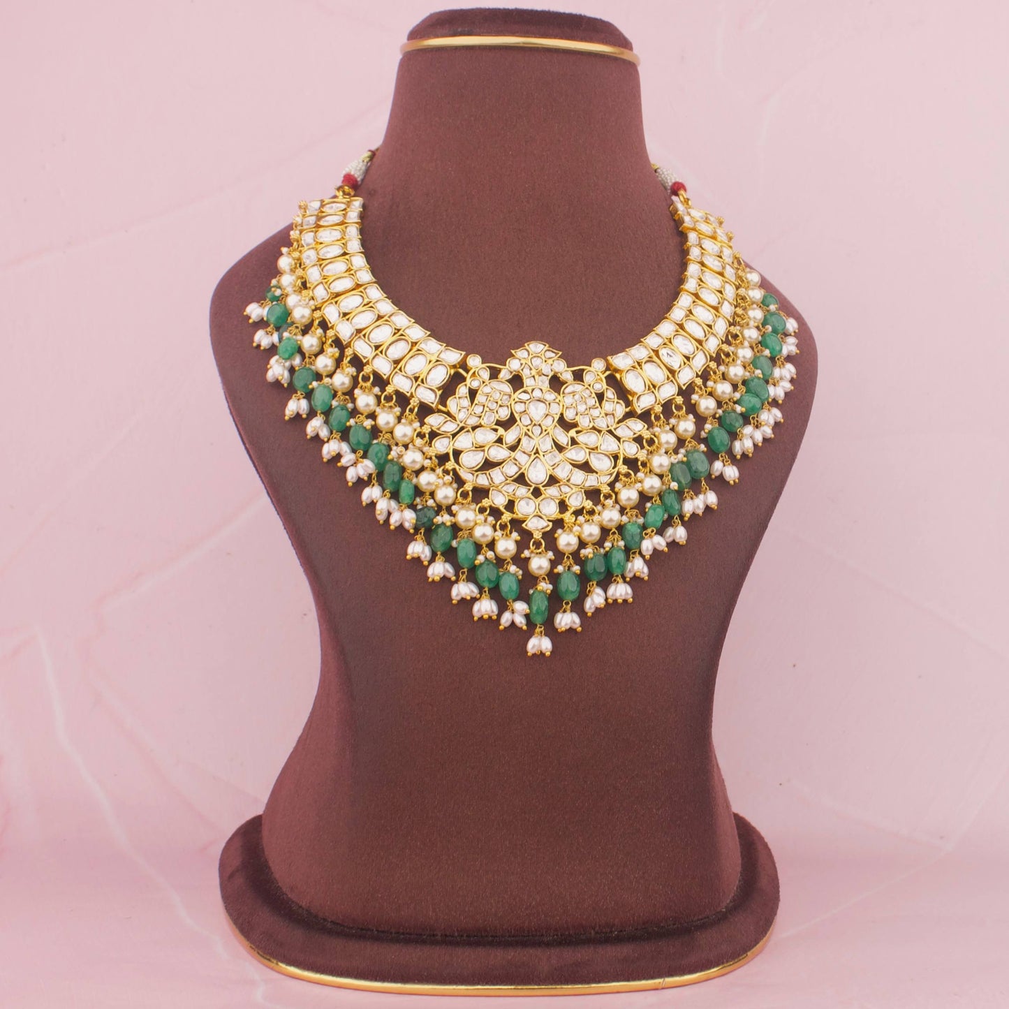 Classic White Kundan Necklace With Emerald Green Beads And Pearl Hangings