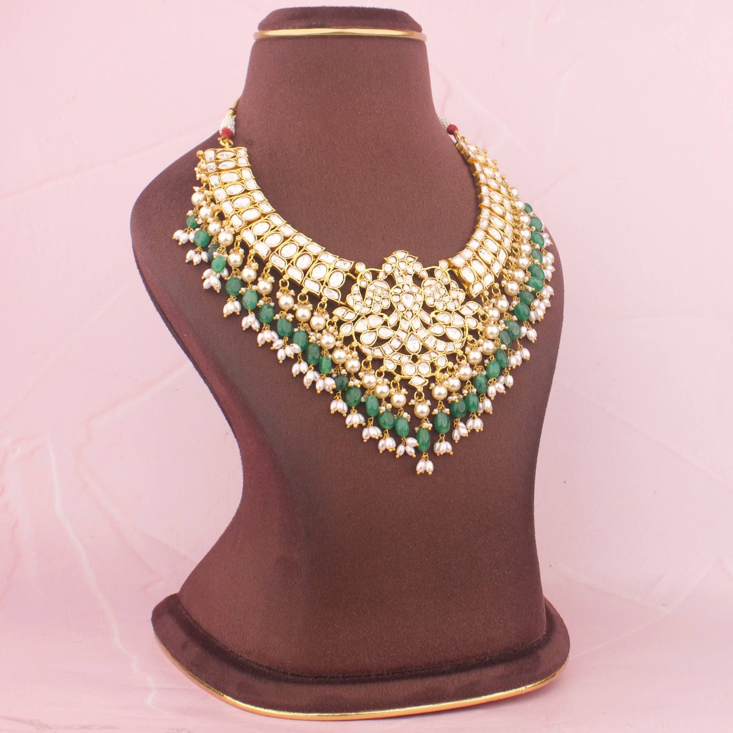 Classic White Kundan Necklace With Emerald Green Beads And Pearl Hangings